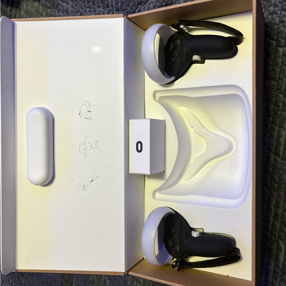 Oculus Black and White VR Controllers and Sensors